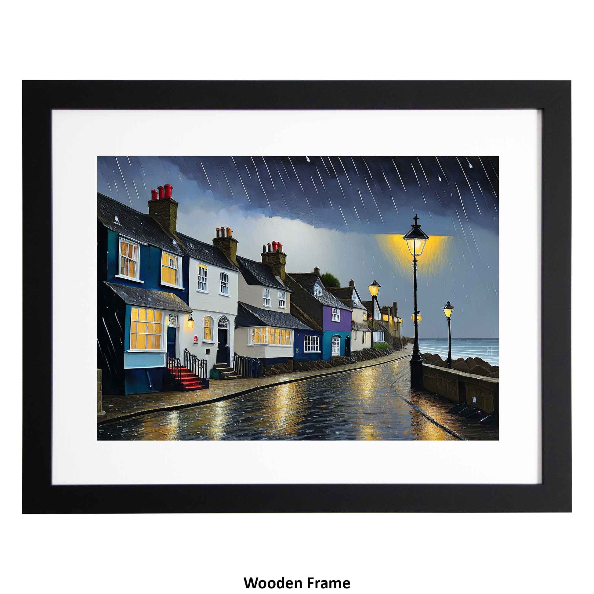Framed artwork of a coastal street at night with houses and a lamp post from Ximago
